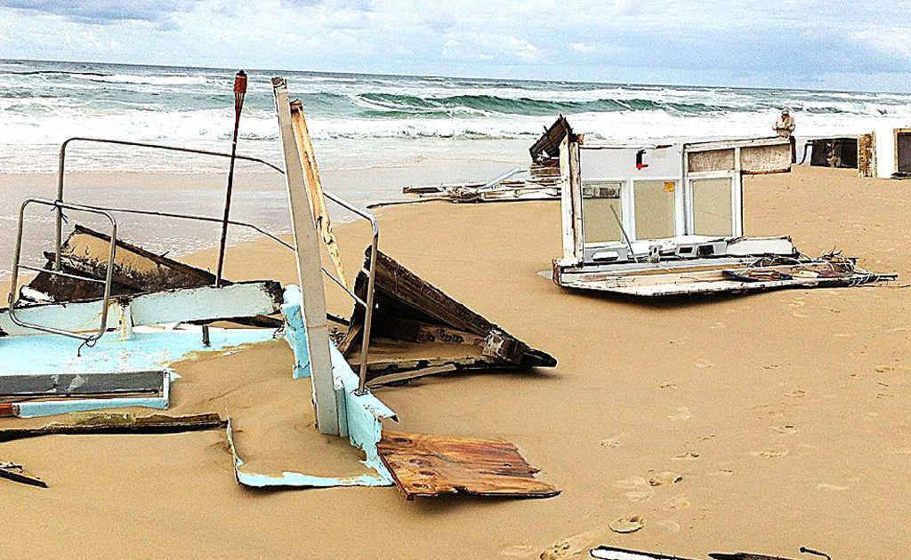 All that remains of a skipper’s boat after swells pummelled it off Fraser Island. The captain stayed with his ship until the end before eventually walking away uninjured. All that remains of a skipper’s boat after swells pummelled it off Fraser Island. The captain stayed with his ship until the end before eventually walking away uninjured.